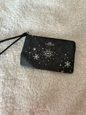 Coach Black Wristlet with Silver Snowflake Motif